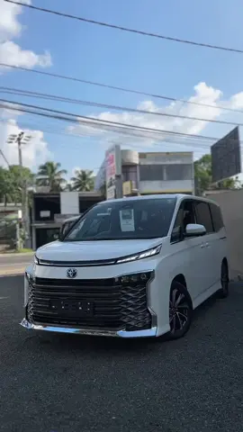 ✨TOYOTA VOXY ( BRAND NEW ) . 	Year: 2025 – brand new, unregistered unit.  	•	Engine / Fuel Type: Typically hybrid (1.8 L) variant available in Sri Lanka.  	•	Seating & Capacity: 7-seater MPV; ideal for families, corporate transport or premium shuttle use.  	•	Interior finish: High-spec finishes available—leather seats, “ottoman” leg rest seating in 2nd row, premium trim.  	•	Premium convenience: Features such as both side power sliding doors, electric tailgate,360° cameras mentioned in local listings.  Exterior & Styling 	•	Bold, modern MPV styling; sharp front fascia, LED headlights and distinctive design cues.  	•	Dual sliding doors (left & right) for ease of access.  	•	Premium alloy wheels (often 17″) in higher spec units.  Interior & Comfort 	•	Luxurious leather interior in premium trim.  	•	Ottoman seats with leg rest in second row: a standout feature for comfort.  	•	Spacious third row and flexible seat configuration – good for family / group transport. 	•	Infotainment: Large head-unit screen (10.5″ in Sri Lanka examples), wireless charger, Apple CarPlay / Android Auto in some listings.  Technology & Safety 	•	Head-Up Display (HUD) appears in premium spec listing.  	•	360° surround cameras and parking sensors included in higher trims.  	•	Advanced safety features built-in: ABS, airbags (front, side & curtain), lane-keeping assist etc referenced in spec documents.  Performance & Efficiency 	•	For example, hybrid 1.8L + electric variant listed achieving ~23 km/L in some markets.  	•	Smooth automatic transmission (E-CVT) and refined ride thanks to modern platform. #toyota #srilanka #voxy #luxury #kurunegala_squad🔰 
