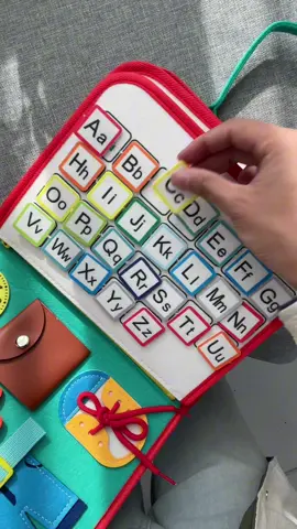 This busy board is so educational and keeps him entertained!! #montessoritoys #busyboard #montessoriboard #busyboardforbaby #educationaltoy     