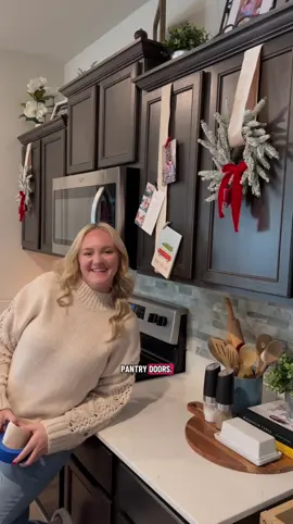 Bring your holiday cards to life with this easy DIY display! Because my fridge can’t hold one more Christmas card 😂🎄 All you need is ribbon, painter’s tape, and a few minutes to turn your cabinets into festive holiday decor ✨ #HolidayHack #ChristmasDecorIdeas #HomeForTheHolidays #DIYHolidayDecor 