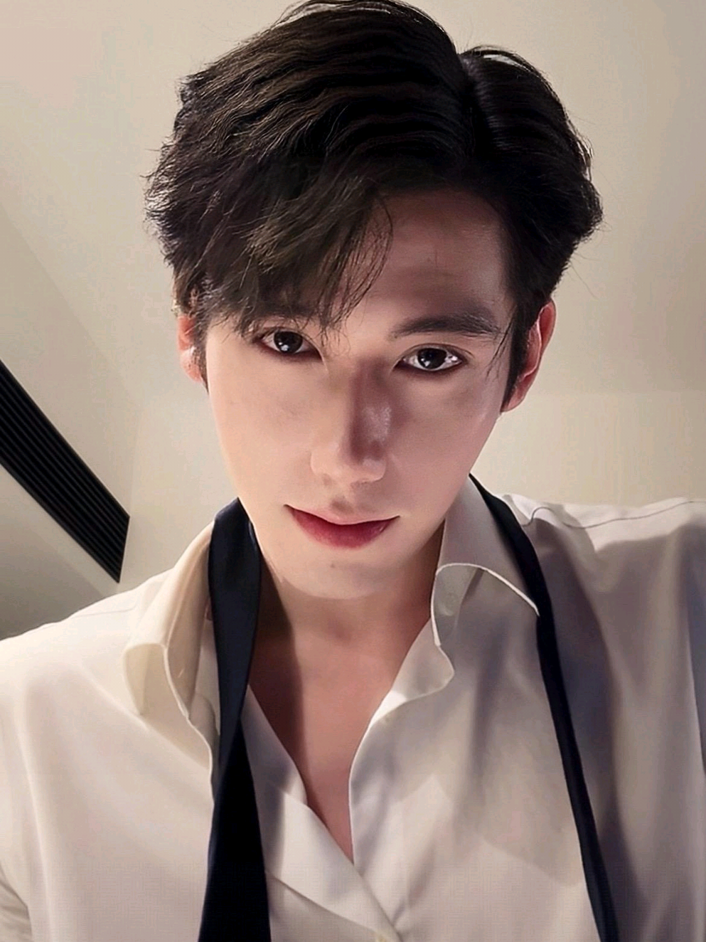 Stepping out into the night. 🌃🌹 It's not about the destination, it's about the mood. 🤍💫Dressed for business, mind on something bigger. 🫶🫧 #nightvibes #bossmoves #mensfashion #outfitoftheday #blackandwhite 