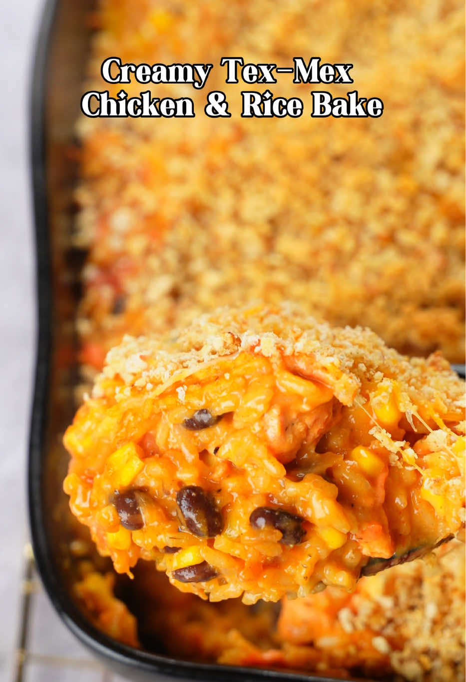 With grocery prices climbing and food stamps on the chopping block, families everywhere are reaching for affordable weeknight staples — because feeding your crew shouldn’t break the bank. 🍗💛 This Creamy Tex-Mex Chicken & Rice Bake is my budget-friendly answer to dinner stress — hearty, flavorful, and made with simple ingredients you can grab at @ALDI USA. 🛒 It’s the kind of meal that stretches, satisfies, and still feels special — creamy, cheesy comfort with a little Tex-Mex kick. 🌽✨ Because you and the kids gotta eat, so let’s make it good. Creamy Tex-Mex Chicken & Rice Bake 🇺🇸🇲🇽 A family-style comfort casserole loaded with creamy rice, tender chicken, and cheesy Tex-Mex flavor! Ingredients     •    1.75 lb (800 g) citrus-marinated or rotisserie chicken, diced     •    1 oz (28 g) taco seasoning     •    2 ½ cups (590 ml) chicken broth     •    1 Tbsp (15 ml) olive oil     •    1 ¼ cups (250 g) long-grain white rice, uncooked     •    12 oz (340 g) frozen corn     •    15 oz (425 g) black beans, rinsed and drained     •    2 cans (10.5 oz / 295 g each) condensed cream of chicken soup     •    ½ cup (120 ml) milk     •    16 oz (450 g) jar salsa     •    2 cups (200 g) shredded Mexican blend cheese, divided Topping     •    1 cup (100 g) crushed Ritz crackers     •    2 Tbsp (28 g) melted butter Instructions 1️⃣ Preheat oven to 350°F (175°C) and grease a 9x13-inch (23x33 cm) baking dish. 2️⃣ In a large pot, heat olive oil and brown diced chicken for about 5 minutes; remove and set aside. 3️⃣ Add chicken broth, taco seasoning, oil, and rice. Bring to a boil, then cover and simmer for 6 minutes. 4️⃣ Stir in corn, beans, cream of chicken soup, 1 cup (100 g) cheese, milk, salsa, and cooked chicken. Season to taste. 5️⃣ Transfer to baking dish, sprinkle remaining cheese on top. 6️⃣ Mix crushed crackers with melted butter, sprinkle over casserole. 7️⃣ Bake uncovered 15–20 minutes, until golden and bubbly. 8️⃣ Rest 5 minutes before serving. ✨ Perfect for meal prep or weeknight dinners—creamy, cheesy, and feeds a crowd! #TexMexRecipestFriendlyMeals #AldiFinds #FamilyDinnerOnABudget #TexMexCasserole #ChickenAndRiceBake   