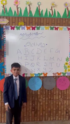 Our amazing special child is confidently showing all English alphabets written on the whiteboard and explaining each one in sign language. This is how our children learn, communicate and teach others as well. Their talent, hard work and confidence make us proud every single day. #SpecialEducation #SignLanguage #DeafChildren #AKInstituteKotli #Inclusion  