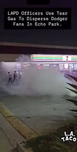 LAPD officers used tear gas to disperse Dodger fans in Echo Park after the World Series. Gas canisters were thrown outside of a 7 Eleven on Rosemont Avenue and Sunset Boulevard. The gas caused people to quickly leave the area. @Lexis-Olivier Ray 