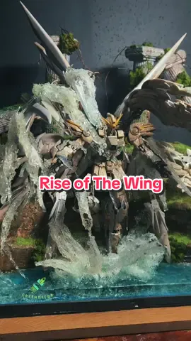 Rise of the Wing Giữa tàn tích phủ rêu và dòng nước gầm vang, một chiến thể cánh thép trỗi dậy từ vực sâu. Ánh sáng chiếu lên lớp giáp sứt mẻ, như lời thức tỉnh của các vị thần xưa. Amid moss-covered ruins and roaring waters, a winged warrior rises from the depths. Light dances on his scarred armor, as if awakening ancient gods. #dregreendecor #gundam #winggundam #customfigure #diorama 