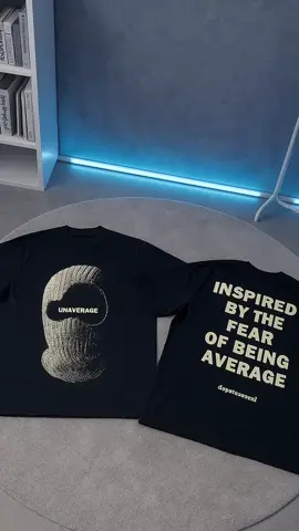 Minimalist streetwear tee na may bold typography “Inspired by the fear of being average” yang nagbibigay inspirasyon sa uniqueness. #StreetStyle #Unaverage #MinimalAesthetic #MotivationalWear #DopeFit