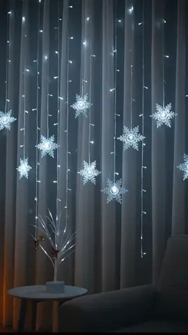 Your window needs this holiday magic! ✨ These snowflake curtain lights are stunning. #christmaslights #curtainlights #holidaydecor #cozyvibes