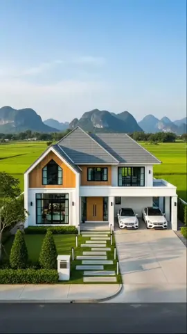 บ้านสไตล์ Nordic White Stone Charm (นอร์ดิกไวท์สโตนชาร์ม) เรียบหรู ดูอบอุ่น ท่ามกลางวิวภูเขาและทุ่งนาเขียวขจี 🍃 บ้านสองชั้นดีไซน์โมเดิร์น เน้นความโปร่ง โล่ง รับแสงธรรมชาติ ☀️ จอดรถได้สองคัน พร้อมทางเดินหินสวยงามหน้าบ้าน ✨ บ้านในฝันของใครหลายคน… แค่ได้มองก็รู้สึกฮีลใจแล้ว 💚 #บ้านสไตล์นอร์ดิก #บ้านในฝัน #บ้านวิวภูเขา #บ้านสวนสโลว์ไลฟ์ #ฮีลใจสตอรี่