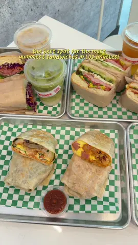 Wiches On Wilshire is a Korean-owned sandwich shop in Koreatown, Los Angeles, that delivers high-quality food and tasty drinks! Their sandwiches are super amazing and each sandwich is made with fresh ingredients. The menu has different varieties of sandwiches and are great for breakfast, lunch, and dinner. The service is fast, super friendly, and has a great vibe overall. Dipping the breakfast burrito into the tomato soup was so good, which I highly recommend! They have a parking garage with free parking or street parking is great too!  On weekends, they have a special deal 50% off all coffee & matcha lattes! 🍵  What I ordered: 	1) Italian Cheese Melt – $15.99 	2) Fifth Ave Pastrami Sandwich – $14.99 	3) Italian Stack (French Roll) – $15.99 	4) Small Tomato Soup – $4.50 	5) Morning Breakfast Burrito (Sausage) – $13.99 	6) Kimchi Breakfast Burrito (Spam) – $13.99 	7) Mama Mia (Ciabatta +$0.50) – $15.99 	8) Banana Pudding – $6.00 	9) Passion Fruit Peach Lemonade + Iced Tea – $3.50 	10) Blood Orange – $5.25 	11) Horchata Cold Brew (Reg Sweet) – $6.50 	12) Vietnamese Cold Brew (Reg Sweet) – $6.50 	13) Iced Matcha Latte (Oat Milk +$0.75) – $6.00 #CapCut #fyp #fypシ #losangeles #sandwiches 