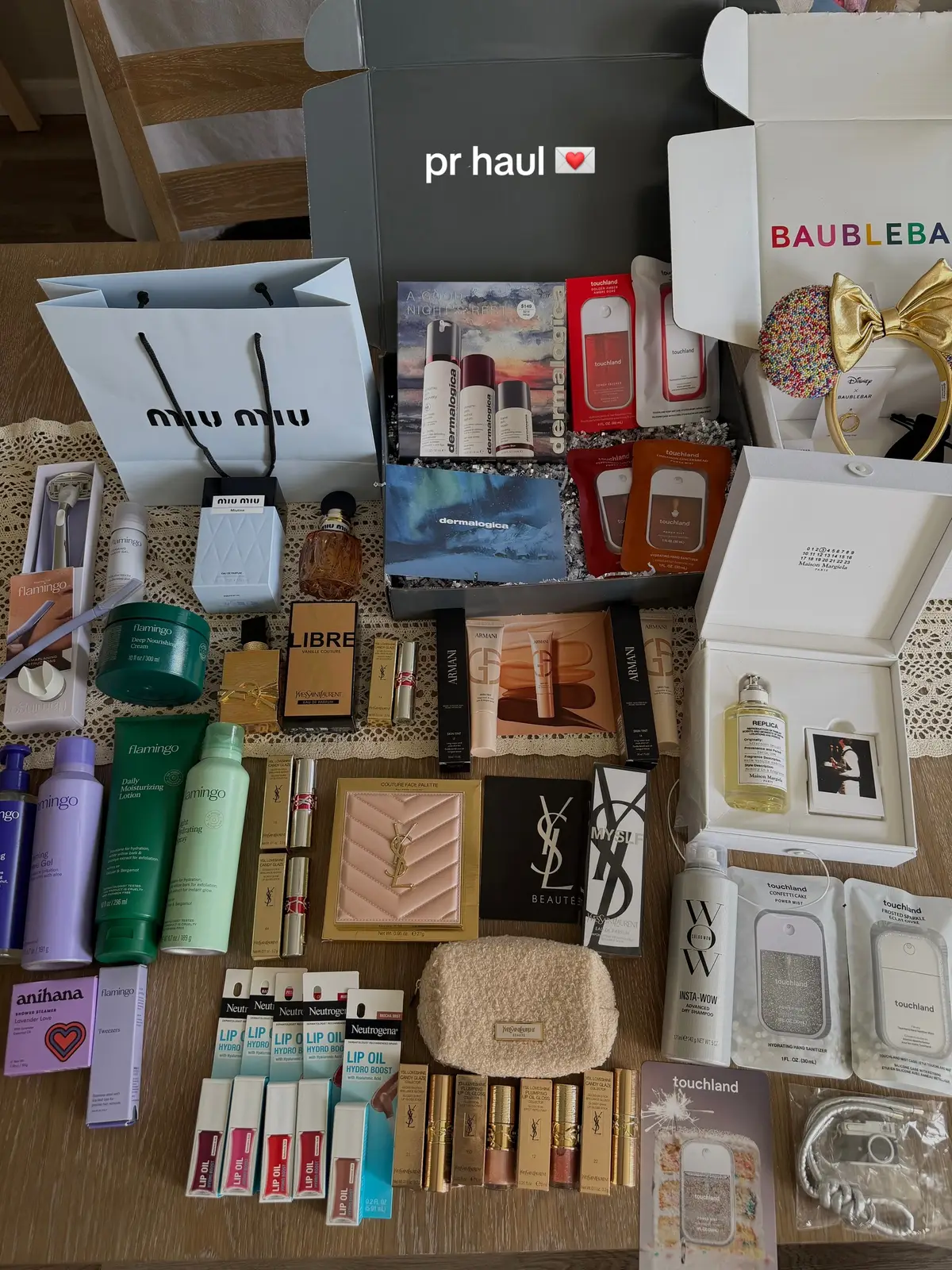 Kisses to all of these brands…. I LOVE YOU and am so thankful for you 🤍 @YSL Beauty @maisonmargielafragrances @BaubleBar @Armani beauty @dermalogica @Miu Miu @Color Wow Hair @touchland @Flamingo @Neutrogena  #prhaul #prhauls #prhaulunboxing #pr #luxurypr #microinfluencer #microinfluencers #microinfluencerpr 