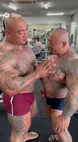 Tattooed Bulks Share a Moment 💥💪 Not romance — just deep respect forged in sweat. Brothers by iron. 💦🤝 #muscle #beefy #bulk #hunk #massive