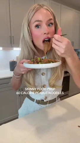 the most delicious tasting, low calorie, perfect base for any protein!!!! 😍 FULL RECIPE ⬇️⬇️ 🥢 Peanut Veggie Noodle Bowls A high-volume, low-calorie meal prep base that’s packed with vegetables and ready for your favorite protein. Makes: 6 servings Calories per serving (base only): ~58 kcal Prep Time: 5 minutes Cook Time: 10 minutes Total Time: 15 minutes 🥬 Ingredients: 2 bags shirataki noodles (10 calories per bag) 4 tbsp powdered peanut butter 4 tbsp coconut aminos 1 medium bell pepper, chopped 3–4 green onions, chopped 6 oz sliced mushrooms (store-bought pre-sliced to save time) 1 (12 oz) bag of mixed vegetables (Trader Joe’s Ready Veggies or similar) 1–2 tsp ginger juice (or fresh grated ginger, if available) Optional: your choice of cooked protein (chicken, tofu, shrimp, etc.) 🍜 Instructions: Make the Sauce: In a small bowl, whisk together the powdered peanut butter, coconut aminos, and ginger juice until smooth. Set aside. Prep the Veggies: Chop the bell pepper and green onions. The mushrooms and mixed veggies can be used as-is if pre-cut. Sauté the Veggies: In a large nonstick pan or wok, heat a splash of coconut aminos over medium heat. Add all vegetables (bell pepper, green onion, mushrooms, and mixed veggies) and sauté for 5–6 minutes, until tender-crisp. Rinse and Add the Noodles: Drain and rinse the shirataki noodles thoroughly under cold water. (This helps eliminate their natural odor.) Add the noodles to the pan with the veggies. Add the Sauce: Pour the peanut sauce over the noodles and veggies. Stir well to coat everything evenly. Cook for 2–3 more minutes until heated through. Portion and Add Protein (Optional): Divide the mixture into 6 containers. Add your choice of protein to each portion if desired — grilled chicken, tofu, shrimp, or tempeh all work well. 🧊 Storage: Fridge: Keeps well for up to 4–5 days in airtight containers. Reheat: Microwave 1–2 minutes until warm. Add a splash of water or extra coconut aminos if needed. 🧮 Per Serving (6 servings total): Calories: ~58 kcal Protein: ~3g