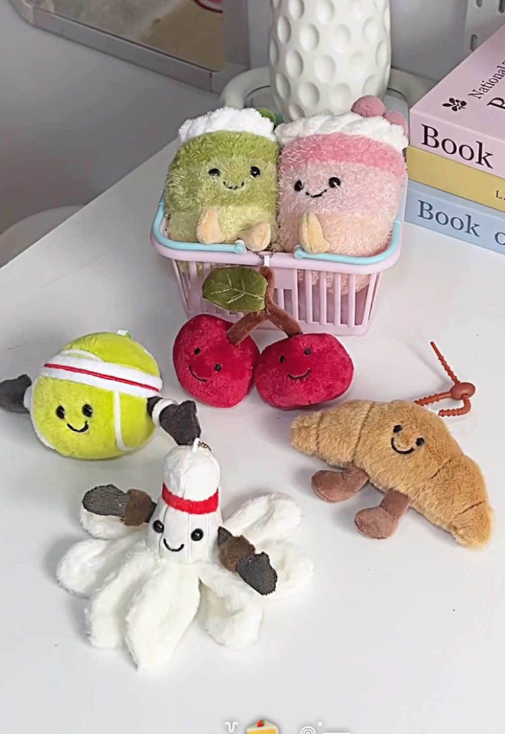look how cutee this croissant | cherry | tennis | badminton shuttlecock | matcha and strawberry cake plushies ✨🌷 #jellycat #jellycatplushies #croissant #charm #keychain 