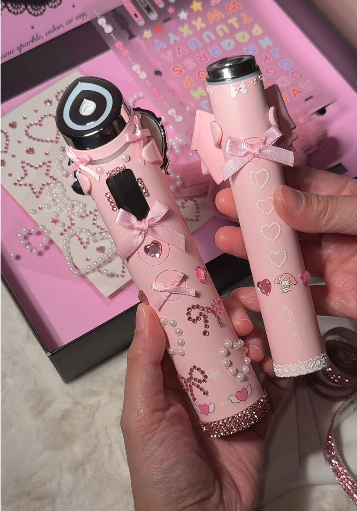 Look how cute these are! I finally was able to bedazzle my devices from @medicube global @medicube US Store @medicube_us what do you think? 🥹✨  Should I giveaway a bedazzle Kit? Let me know if you want one 😊💕 #medicube #medicubedevice #pink #kbeauty #medicubebedazzlekit  