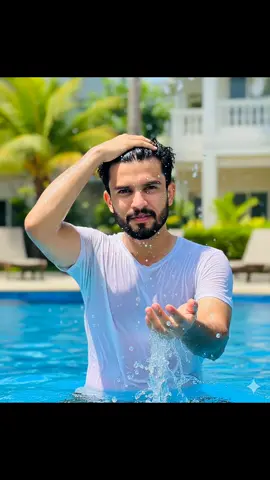 😍❤️‍🩹👇👇💀🔥🔥 How to make? 1- Open GEMINI. 2- Upload your photo. 3- Copy and paste the GEMINI prompt from above. 4- Don't forget to follow. PICTURE PROMPT  A close-up, vertical portrait of a young man with a dark mustache and beard, standing in a bright blue swimming pool. He is wearing a white t-shirt. He is splashing water with his left hand, creating a dynamic spray of droplets in the foreground. His right hand is resting on his head, pushing back his wet dark hair. The background is a soft, blurry (bokeh) view of green trees and a light-colored structure, indicating a sunny outdoor setting. Bright, natural lighting. High resolution, vibrant colors. #geminitrend #trending #onemillionviews #onemillion #googlegemini10