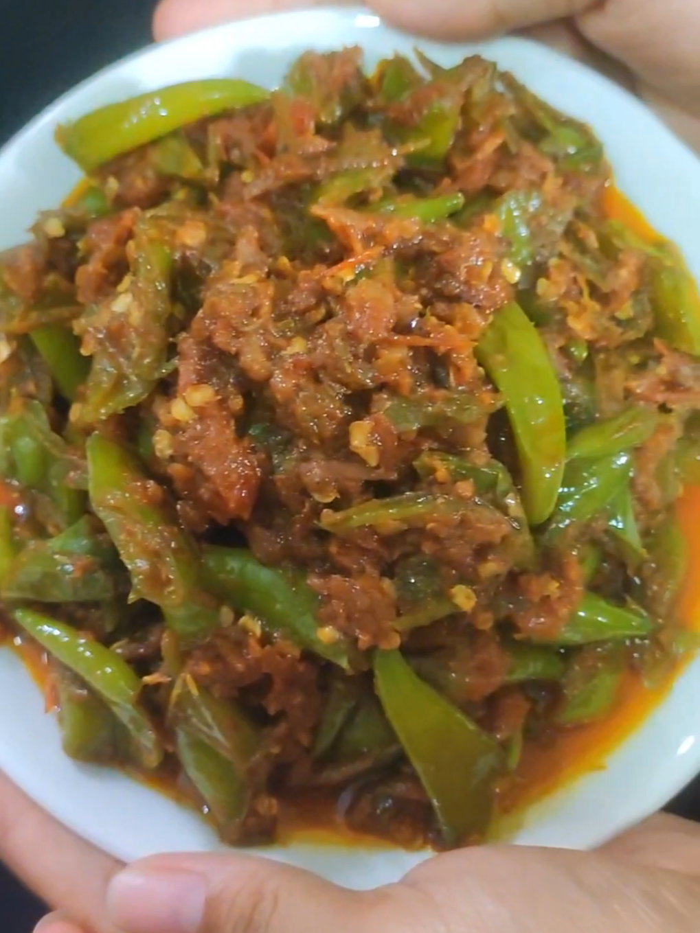 ငရုပ်ပွအရှည်သီးလေးကိုအစပ်လေးကြော်စားမယ်😋😋😋#ငရုပ်သီးစိမ်းငပိချက်#ငရုပ်ပွချက်နည်း#ငရုပ်သီးအစပ်ကြော်နည်း#မြန်မာအစားစားလွမ်းသူများအတွက် #ငရုပ်သီးစိမ်းပုဇွန်ခြောက်ကြော်နည်း