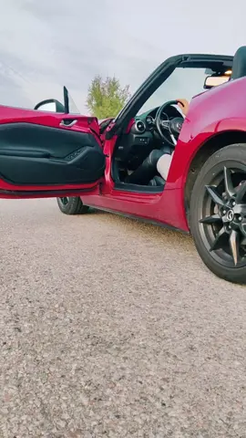 You caught me getting comfortable on my Miata, adjusting my Over-the-Knee leather boots 🖤🔥 #Boots #LeatherBoots #HighHeels #DrivingInHeels #Casadei 