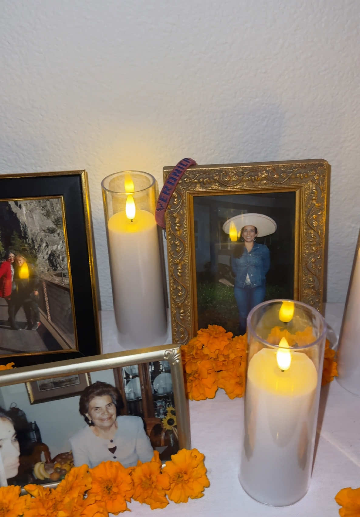 I hosted our family’s first ofrenda & rosario for our loved ones this year. Such a beautiful way to gather in prayer & honor the people we still carry with us every single day 🧡 #allsoulsday #diadelosfielesdifuntos #diadelosmuertos 