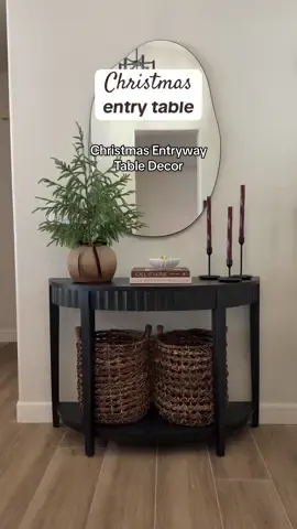 Easing into Christmas with this entryway table decor🎄 I used a Norfolk tree, deep red taper candles, and bell accents for a festive touch✨ #christmasdecor #christmasinspo #christmasideas #christmasmood #entrywaydecor 