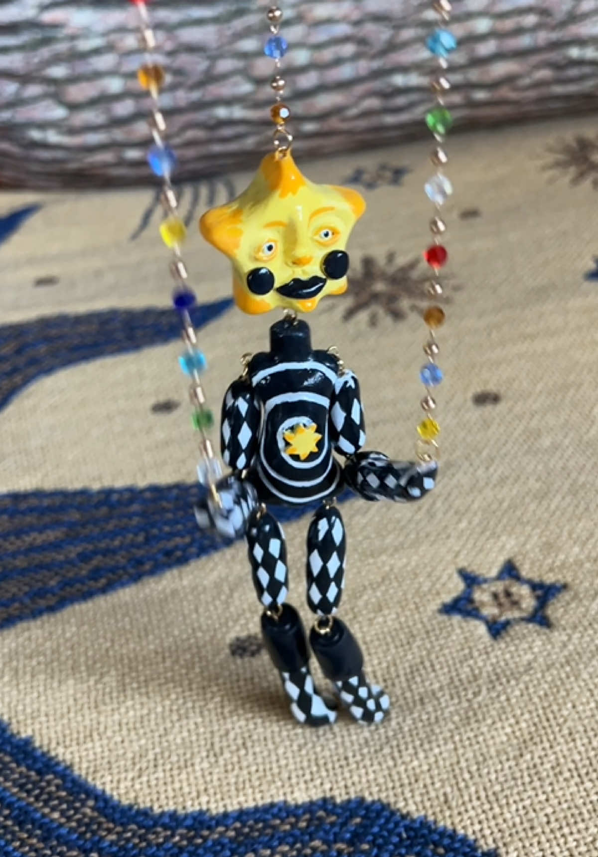 A commission in the form of “can you please make whatever you want?” which took the form of this goth star, and I love it. 🌟 The spiral in the middle was a lot of fun to make and I think the black and white looks super juicy and opaque. I am still working on commissions!! My two star made to order slots are now sold out, but I hope to have some more up next week. Keep an 👁️ out… #polymerclay #puppet #artistsoftiktok 