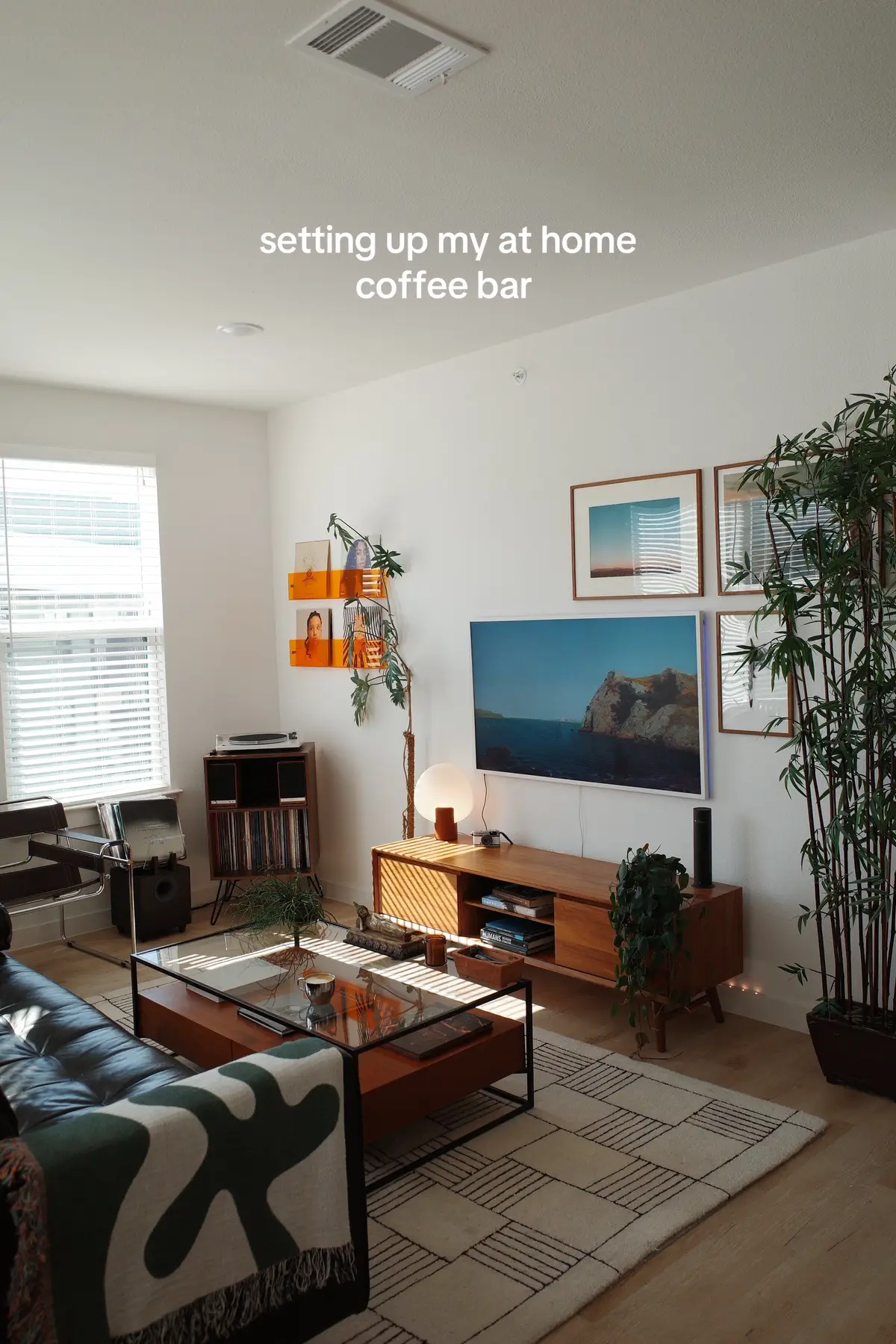 My home coffee bar set up. Finally have a dedicated space for my morning coffee. I got the Jasper storage cabinet in black oak from @Nathan James Home and everything fit perfectly. Can’t wait to add more details and art on the wall to tie everything together #nathanjamespartner  #coffeebar #apartmentdecor #cozyathome  