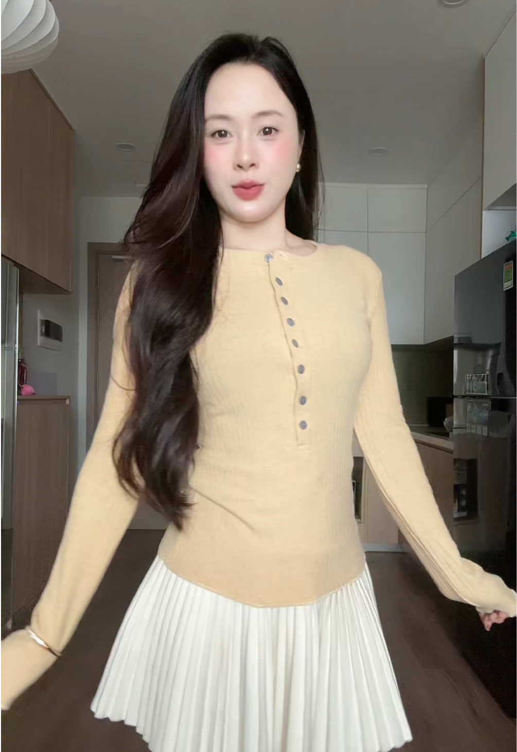 Con áo này màu lạ mà xinh lắm nha