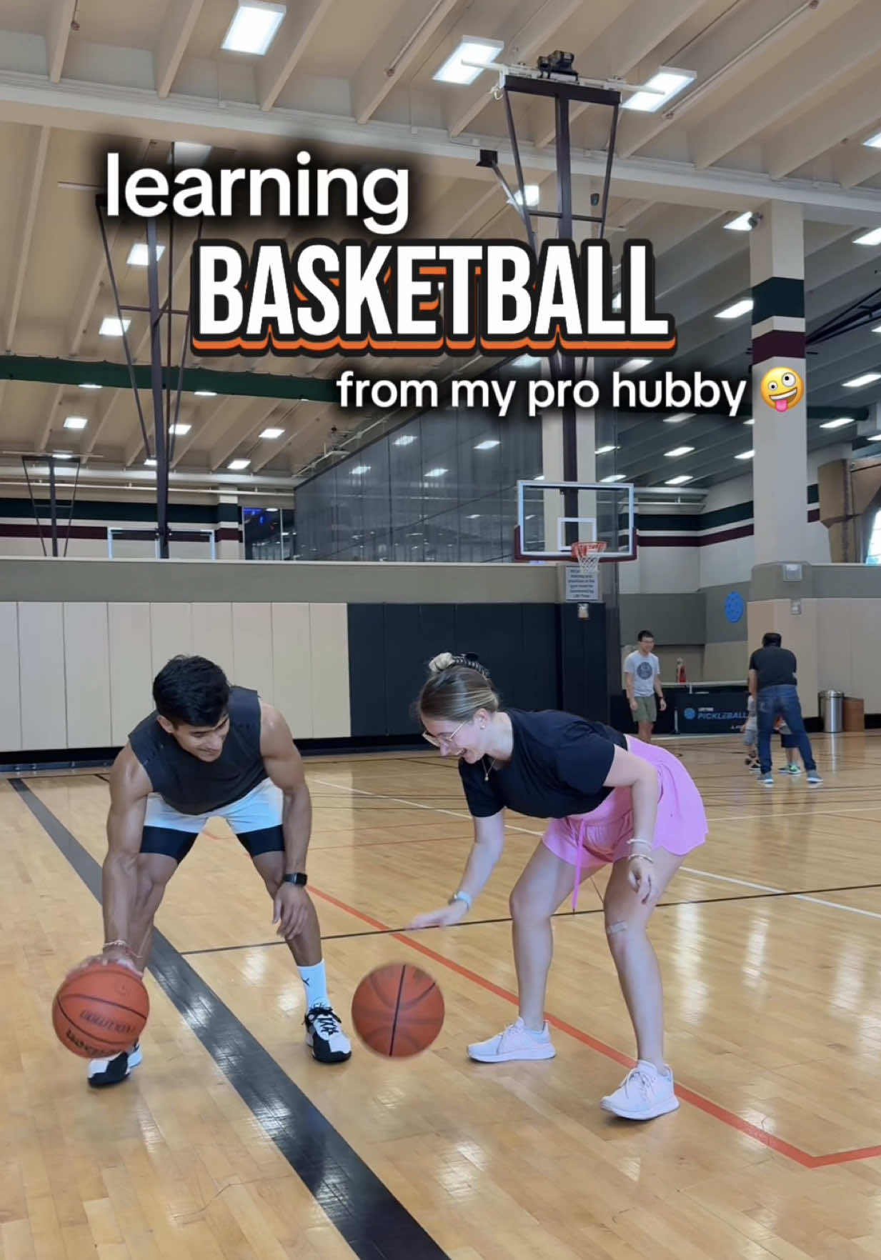 when your husband is a professional basketball player & you can’t resist interrupting his practice 🤪🏀❤️ @gaurav.patwal99 #interracialcouple #indianhusband #indianamericancouple #dallascontentcreator #basketballwife 