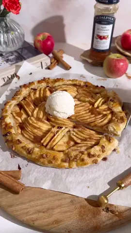 🍎 Nothing says cozy fall vibes like an apple galette fresh out of the oven! 🍂 This seasonal treat is made even better with St. Dalfour’s Apple Cinnamon fruit spread—100% fruit, no added sugar, and all the deliciousness. It’s the perfect way to enjoy the flavors of fall, wrapped up in a rustic, golden pastry. 🥧 Fun fact: did you know that St Dalfour focuses on using traditional French recipes by slow-cooking their spreads to retain the natural flavors and sweetness of the fruits? 📝What you’ll need for the filling ▪️ 1 sheet store-bought pastry dough ▪️ 3 apples, cored and sliced ▪️ 6 tablespoons St Dalfour Apple Cinnamon fruit spread, divided ▪️ 2 teaspoons flour ▪️ 1 teaspoon cinnamon ▪️ 2 tablespoons walnuts, chopped In a bowl, combine the apples with 4 tablespoons of St. Dalfour spread, cinnamon and flour and toss. Preheat the oven to 375°F. Flatten the dough into a ⅛” thick disc over parchment paper. Sprinkle flour in the center, and begin arranging the apples on top, leaving a 1-2 inch border around the edge. Fold the edges over the filling as shown in the video. Brush the folded edge with 2 tablespoons of St. Dalfour spread. Sprinkle chopped walnuts on the edge. Bake for 30-35 minutes, until golden on top. Enjoy!