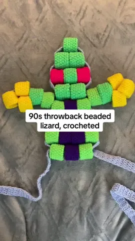 Yall remember those beaded lizards we made in the 90s?? I made a giant squishy one🦎 (crochet, acrylic worsted weight, approx 4wks to make, design my own) #crochet #craft #hobby #handmade #90s 