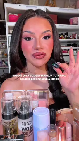 Baddie on a budget makeup tutorial using so many new products and they did NOT DISAPPOINT👀🤭 the skin prep, the base, the blush, the powder, the lipppie…. They’re most definitely staying in rotation 🤠 @Bubble Skincare cosmic milky toner  @loréal paris usa lumi glotion, lip oil, infallible concealer (320)  @Hard Candy blur on block primer, glow on lock & look on lock setting spray  @Maybelline New York lumi matte foundation 119, lifter Stix 65 @Beauty Creations Cosmetics “burgundy flush”, “barley beige” brightening powder  @Makeup Revolution mega bronzer, bouncy berry blush, jelly shine “ethereal pink” ,  “chauffeur nude” satin lipstick  @essence.cosmetics flawless skin trio 10 loose powder @Milani Cosmetics plumping lip liner “hot tamale”  @KIKO Milano USA hydra extreme gloss 01  [full face of affordable makeup, drugstore makeup, base makeup]  #baddieonabudget #MakeupRoutine #basemakeup #fullfacemakeup #makeupchallenge 