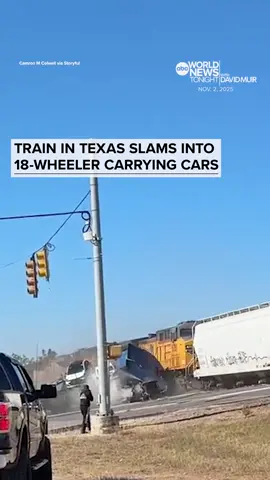 Video shows the moment a #train slammed into a semi-trailer truck carrying cars after a driver attempted to maneuver across a level crossing in Schertz, #Texas. The #truckdriver can be seen leaving the #truck cabin moments before the collision. The force of the impact reportedly pushed it about 50 yards. The Schertz Police Department said the 18-wheeler had been stopped on the south part of the tracks when it was struck by the westbound train. No injuries were reported and the train did not derail. #WorldNewsTonight