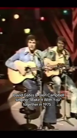An interesting fact about David Gates and Glen Campbell performing “Make It With You” live in 1975 is that it was a rare collaboration between two of the smoothest voices of the soft-rock era — Gates, the frontman of Bread, and Campbell, already a superstar. The performance stood out because Glen Campbell had actually covered “Make It With You” a few years earlier, and singing it alongside the song’s original writer made it a kind of full-circle moment that showcased their shared roots in polished, melodic pop craftsmanship… #guitar #acoustic #70s #country #music 