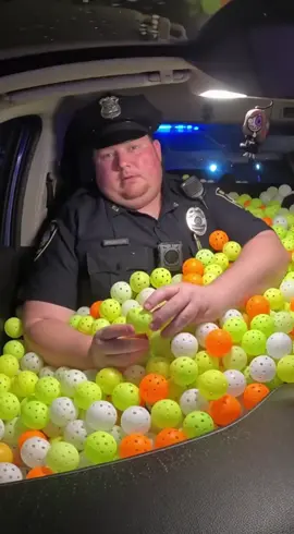 Police officer loaded down found full of pickleballs in his squad car. #pickleball #police #policeofficer #tennis #pickleballtiktok 