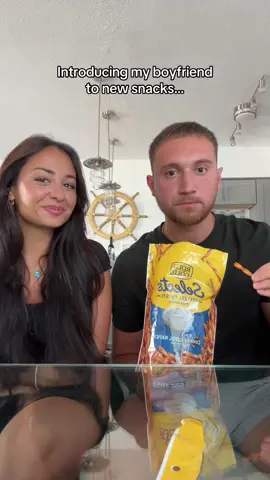 His reactions were priceless 😭 let me know any other pretzels he should try! #fyp #couplescomedy #couplescontent #boyfriendreaction #calebnandrea 