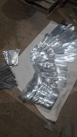 Working on wings for the armor #artist #sculpture 
