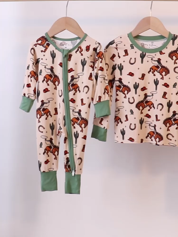 🤠🌵 Soft comfort meets wild western charm! #WesternStyle #BambooKidswear #SmockedHoney #ClassicKidswear #SoftAndSustainable #PlaytimeReady #CowboyCute