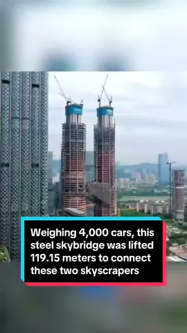 کوردی/عربي/English نوێگەری شێوازی چینی: دەستکەوت و پلان (6) ئەم ئۆڤەرپاسە پۆڵایە کێشی دەگاتە ٤ هەزار ئۆتۆمبێل و بەرزکرایەوە بۆ بەرزی ١١٩.١٥ مەتر (نزیکەی ٤٠ نهۆم) بۆ ئەوەی دوو ئاسمان لە شاری شێنژن لە باشووری چین بەیەکەوە ببەستێتەوە. ‏‎ــــــــ ـــــــــ ـــــــــ ـــــــــ ـــــــ التحديث الصيني النمط: الإنجازات والمخطط (6) يبلغ وزن هذا الجسر العلوي الفولاذي ما يصل إلى ٤٠٠٠ سيارة، وتم رفعه إلى ارتفاع ١١٩.١٥ مترًا (حوالي ٤٠ طابقًا) لربط ناطحتي السحاب في شنتشن جنوب الصين. ـــــــ ـــــــــ ـــــــــ ـــــــــ ـــــــ Chinese Modernization: Achievements and Blueprint (6) Weighing as much as 4,000 cars, this steel skybridge was lifted 119.15 meters (about 40 stories high) to connect these two skyscrapers in South China's Shenzhen. #China #Achievement  #ChineseModernization #ChinaInfrastructure #Shenzhen