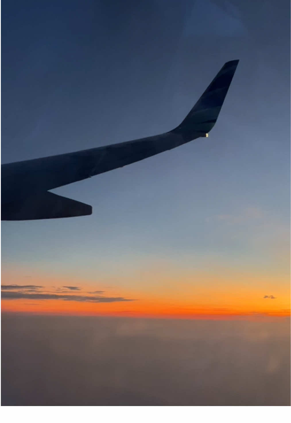 sunset from the window seat🌅✈️  #indonesia #airplane #sunsetlover #sunset #sunsetvibes 