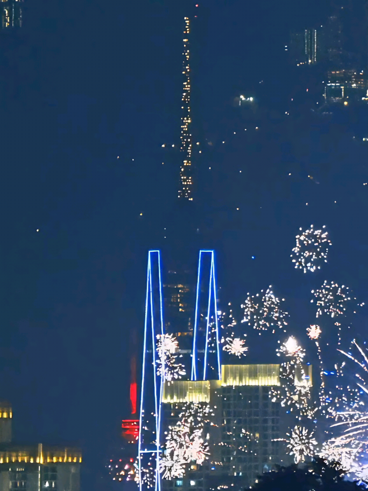 Just got to know our iconic Merdeka 118 won the Best Tall Building (300 meters and above) award by Council on Vertical Urbanism (CVU). So, let's celebrate with some fireworks! Merdeka 118 may be the second tallest building in the world, but to me in terms of how cool it looks, it's second to none! This was shot the same night as my previous few posts where I got Merdeka 118, Petronas Twin Towers, KL Tower and Genting Highlands all in one single frame. But I was a litrle extra lucky that night. It so happened, there were people still celebrating Deepavali and were setting off fireworks!  This was shot all the way from Cyberjaya. From my vantage point, Genting Highlands is about 57KM away in a straight line. Meanwhile the Merdeka 117 was about 25KM away. So, do you want to know where I shot this from? Made possible with:  Nikon Z8 Nikkor Z 180-600mm F/5.6-6.3 VR #fireworks #gentinghighlands #merdeka118 #petronastwintower #kualalumpur 