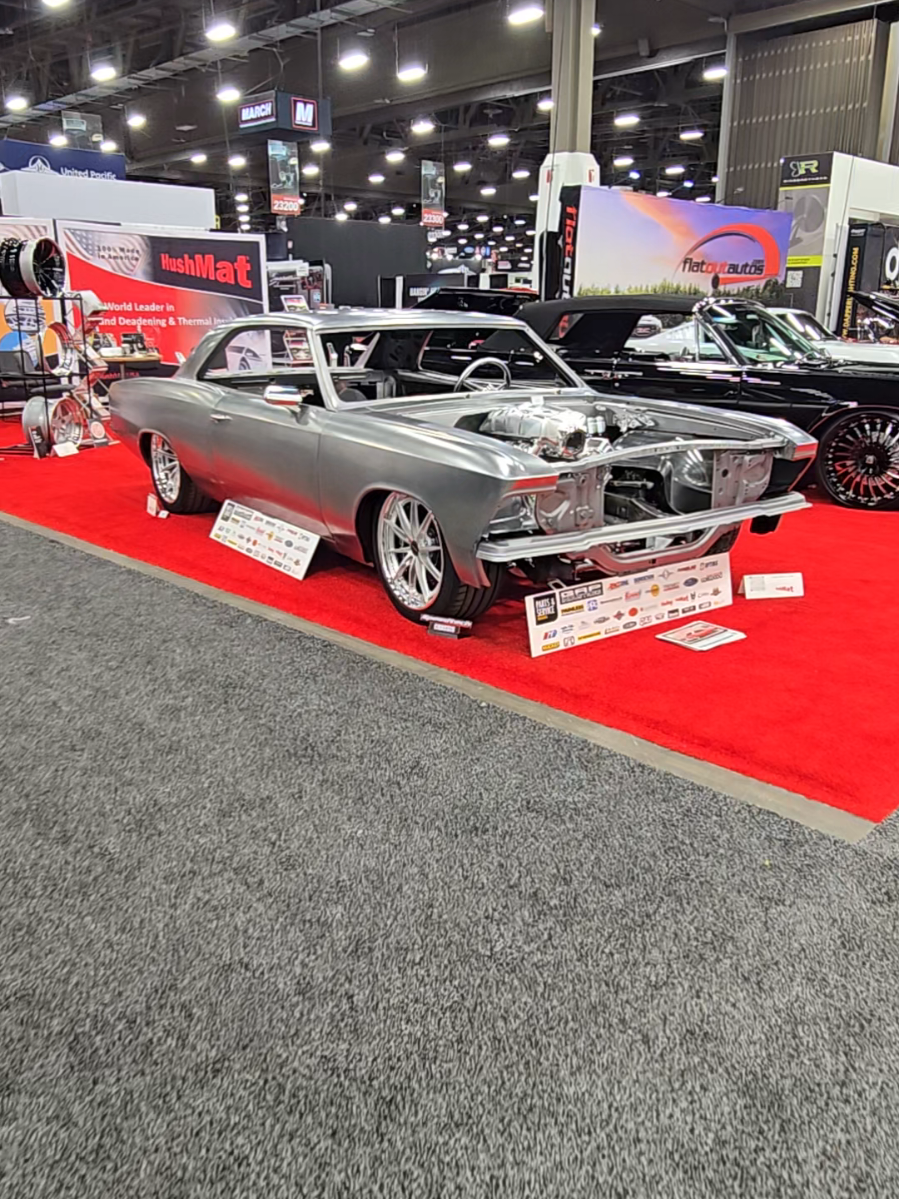 Insane body work on this Chevelle! Love when cars are displayed in bare metal! And the cantilever rear suspension! #chevelle #metal #custom #suspension #sema 
