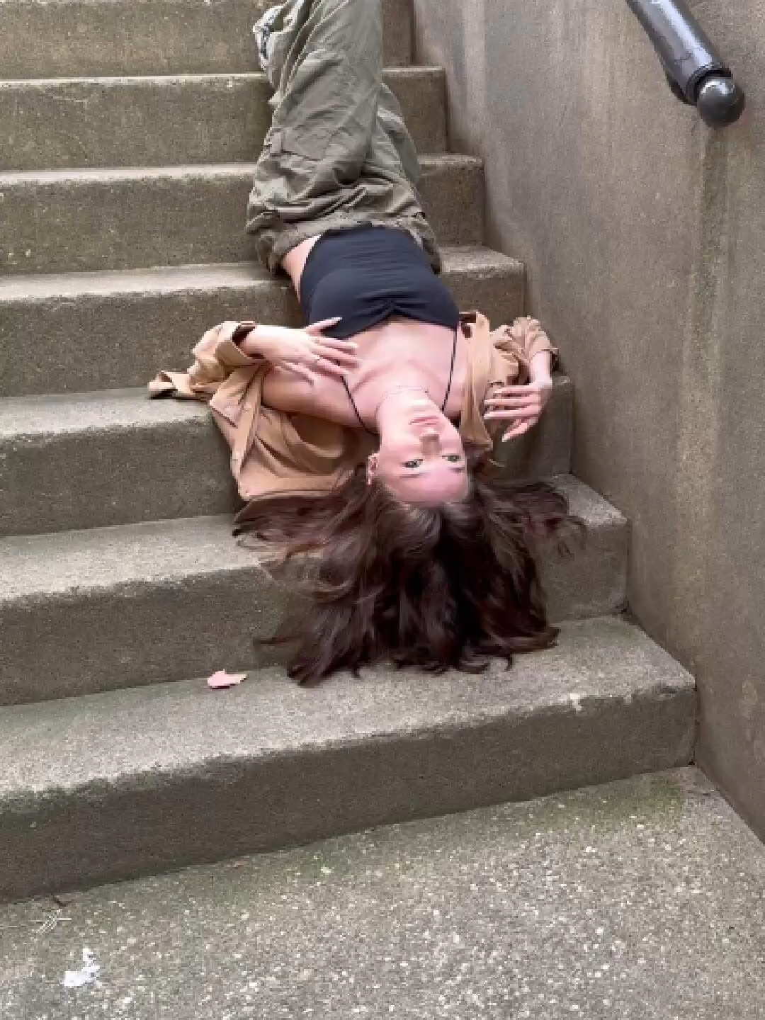 Behind the scenes of an urban senior picture photoshoot.