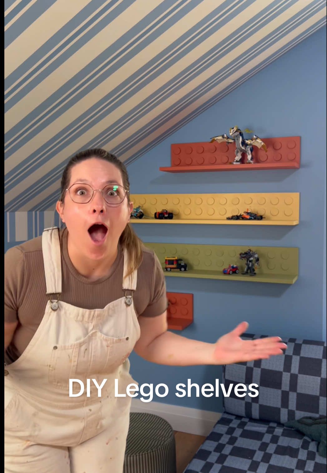 I was planning to make my son a cozy book nook in this corner of his room… but he had a different vision 😅 He requested a spot to display all his LEGO creations instead! I pulled this off using just 3 amazing tools from the @Dremel Blueprint line. Can you believe that saw station? It made every cut so smooth (also did you spy the laser to line up your cuts?!), and the whole Blueprint lineup makes DIY projects easier than ever. As someone who constantly misplaces everything (hehe… whoops), the integrated stud finder in the Multi-Drill is life-changing. It made hanging these LEGO shelves a total breeze. #DremelPartner #lego #legotiktok 