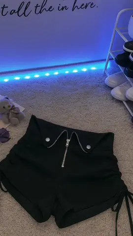 Stylish high-waisted black shorts with side drawstring detail, perfect for casual streetwear and trendy minimalist looks. Ultra-clean aesthetic and modern vibe. #StreetwearStyle #MinimalistFit #TrendyOutfit #CasualWear #FashionShorts     