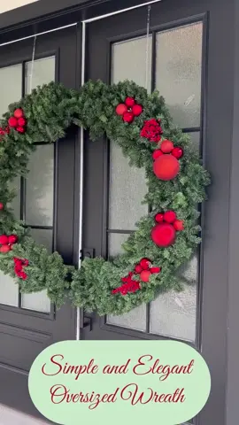 A simple oversized wreath can make a big impact in your holiday decor! #christmasdecor #christmaswreath #outdoorchristmasdecor #holidaydecorating 