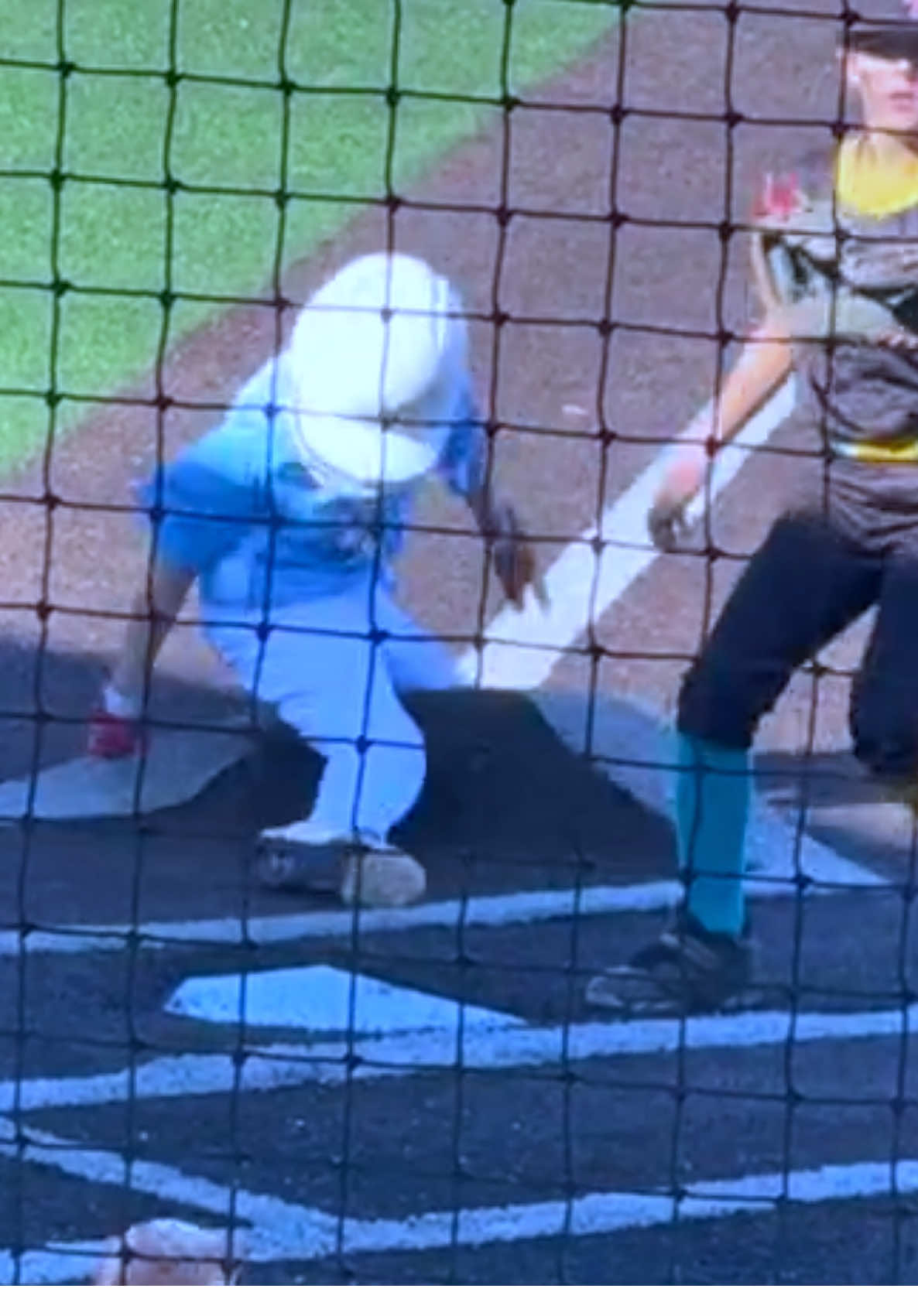 Kid Escapes Serious Injury After Sliding on Turf Field 👀😬 #fyp #baseball #explorepage #baseballtiktoks #baseballtiktoks 