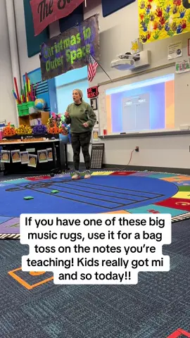 This is harder than it looks! I started teaching G and E, as so and mi in solfège to first graders and they had so much fun!  We started by learning the pitches then playing them and then trying to toss bean bags on them. It was so fun!! #musicteacher #musicteachersoftiktok #firstgrade #elementarymusic #musicclass