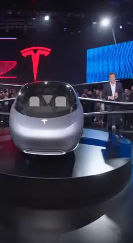 The future just landed — and lifted off. 🚀 Tesla unveils the Model Y Flyer, a fully electric flying car capable of vertical takeoff and hover flight. Captured live at the Tesla World Expo, the demo shows the Flyer rising gracefully from its platform as stunned spectators record the moment that changes transportation forever. Real event energy, real crowd reactions, and the unmistakable Tesla design language — this looks too real to be fiction. #TeslaFlyer #ModelYFlyer #FlyingCar #TeslaInnovation #FutureTech