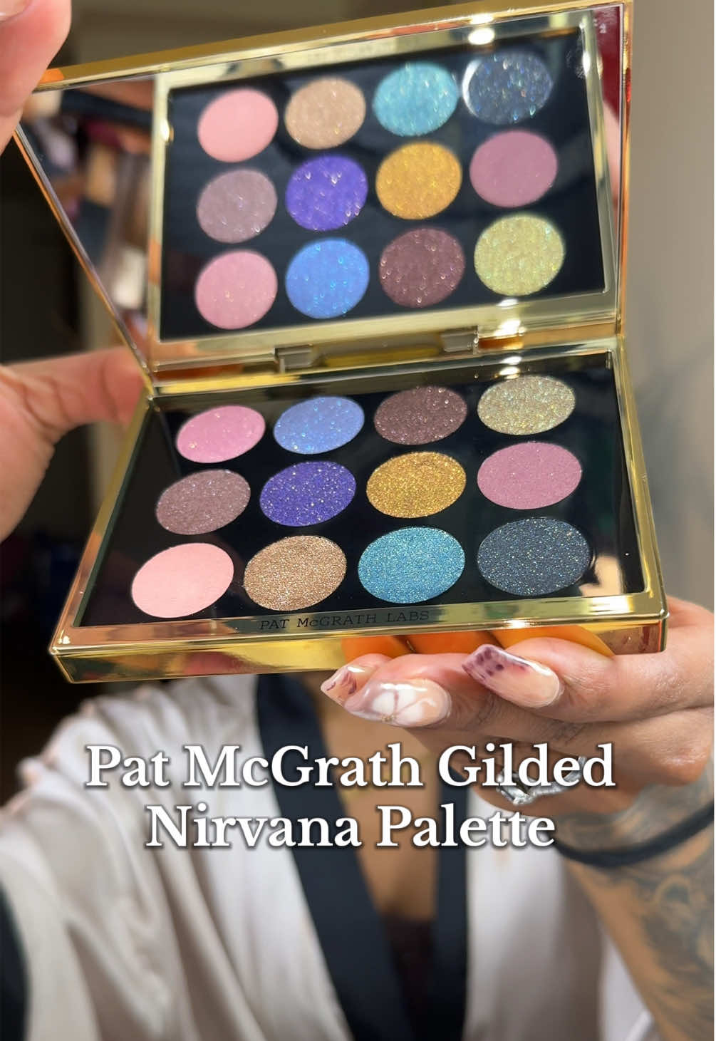 She’s STUNNINGGG @Pat McGrath Labs gilded nirvana palette im Obsesssssed. I cannot wait to explore with this palette and it’s my first high end eyeshadow palette the colors and the textures are so vibrant and creamy (not patchy) yall are about to be SICK of me !  #eyeshadowpalette #patmcgrathlabs #gildednirvanapalette #makeup #blackgirlbeauty 