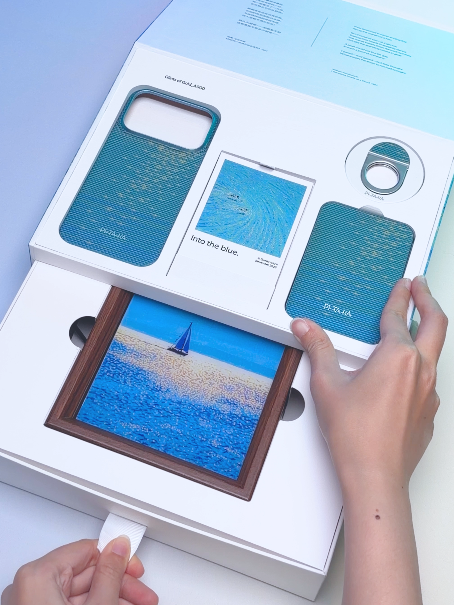 Unboxing Glints of Gold Gift Box: ☀️Inspired by sunlight glinting off the waves ✨Designed with artist Gordon Hunt, every weave reflects light like a memory of summer #pitaka #iphonecase #phonecase #unboxing #powerbank #grip #fyp
