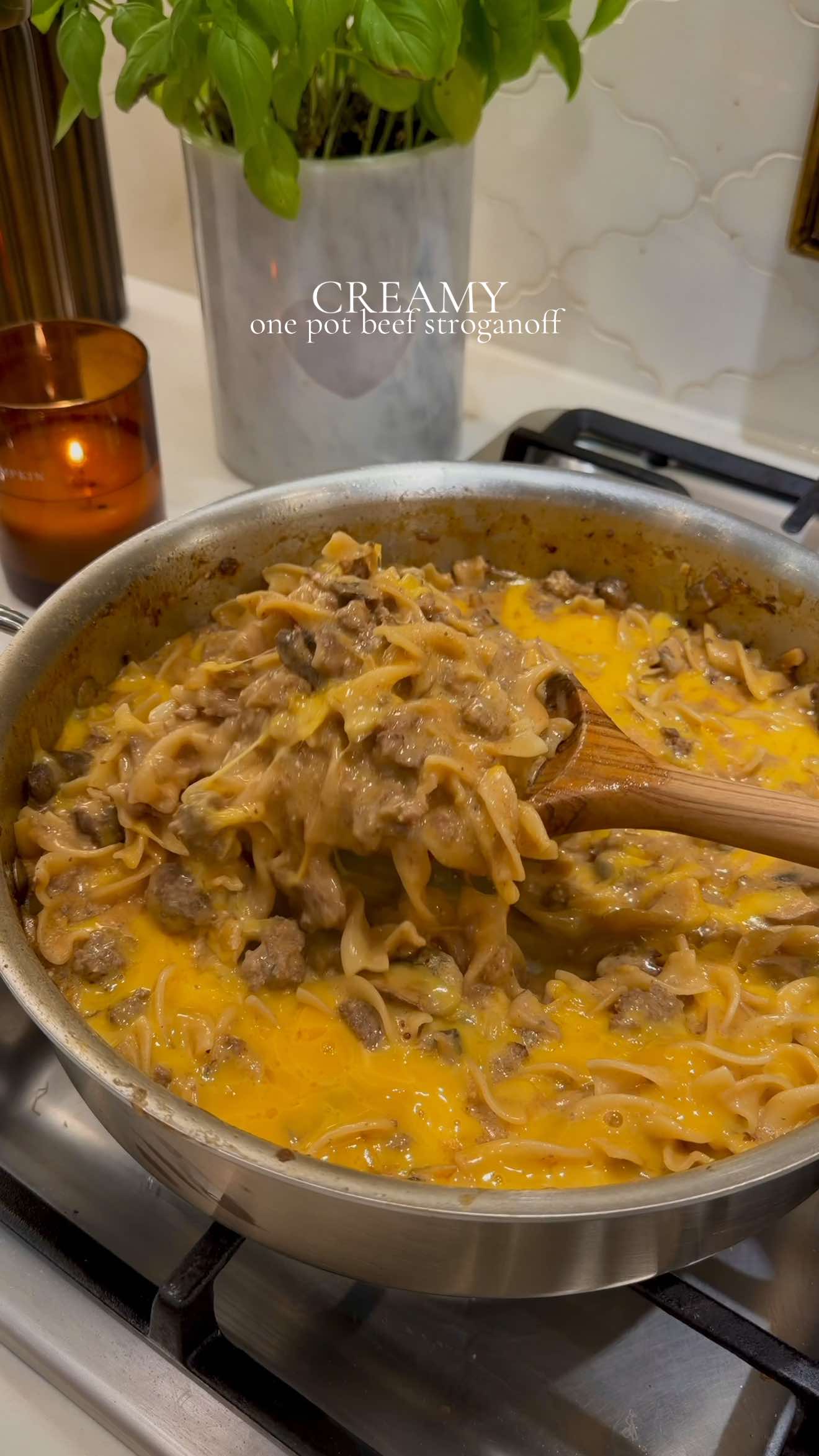 This is the perfect one pot dish to make on those nights that you simply don’t feel like cooking or doing dishes, but need something quick and delicious for you and your family! And I know I have a winning recipe when both of my kids approve! 🧀 Full recipe is on my blog! CREAMY ONE POT BEEF STROGANOFF  Ingredients ✨1 lb ground beef (85/15) ✨1 tbsp butter ✨½ yellow onion, diced ✨9 baby bella mushrooms, chopped (about 10 oz) ✨3 tsp onion powder ✨1 tsp garlic salt ✨2 tsp Worcestershire sauce ✨1 tbsp tomato paste ✨2 tsp low-sodium soy sauce ✨1 tsp whole-grain mustard ✨4 garlic cloves, minced ✨3 cups beef stock (Better Than Bouillon) ✨1 can Campbell’s cream of mushroom soup ✨1 bay leaf ✨6 oz egg noodles (about half a 12-oz bag) ✨2 oz cream cheese ✨Cheddar + mozzarella, to taste ✨Parmesan + red chili flakes, for topping Instructions 1.	Brown beef over medium heat. 2.	Add butter, onion, and mushrooms; season with onion powder and garlic salt, and cook until softened. 3.	Add Worcestershire, tomato paste, soy sauce, mustard, and garlic; sauté 2–3 minutes. 4.	Stir in beef stock, cream of mushroom soup, and bay leaf; bring to a simmer. 5.	Add egg noodles, cover, and cook on low for 7 minutes. 6.	Stir in cream cheese. 7.	Top with cheddar and mozzarella to melt; serve with Parmesan and chili flakes.  #onepotmeals #beefstroganoff #easydinner #cookwithme  #quickdinner
