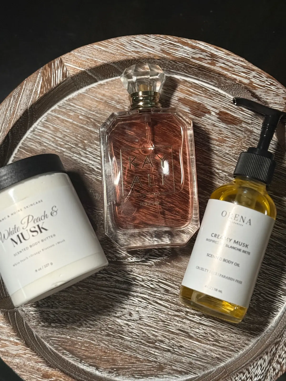 Today's Scent Combo has been my favorite to wear during the day and even going to bed. It's clean and musky just the perfect combo!! @Blanc and Noire Skincare white peach & musk  @Kayali @Mona Monica Kattan🧸 musk 12  @Orena Fragrances creamy musk CODE jessica1 #layeringqueen #scentcombo #scentoftheday #scentcombos #perfumetiktok 